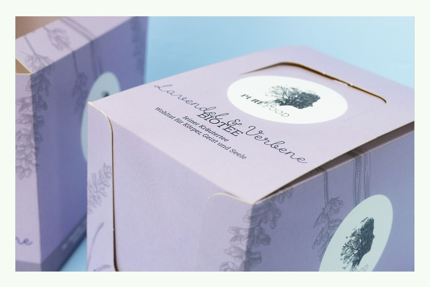 Rosa Thekendisplay aus Karton mit rundem Logo